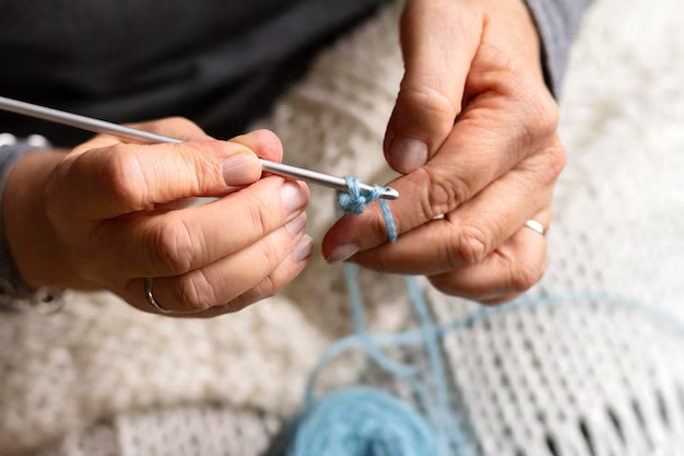 Close up of woman knitting