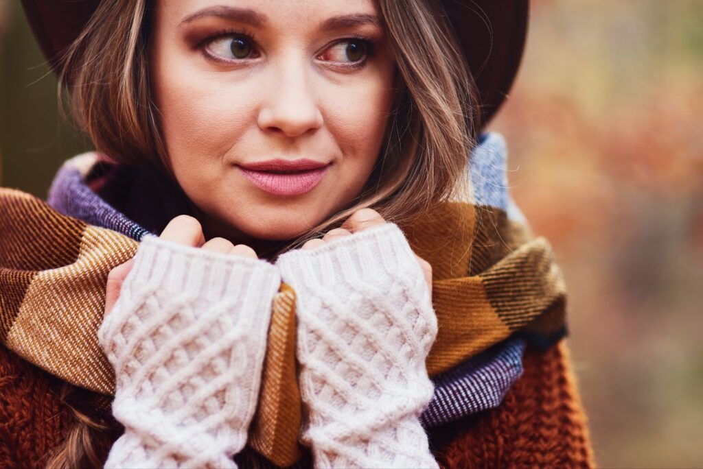 Woman in warm clothes and gloves